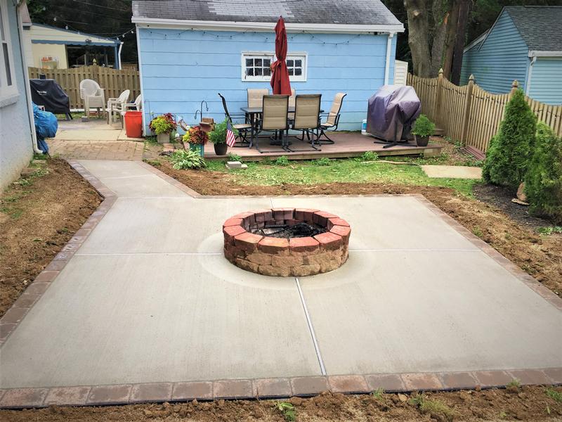 concrete patio with firepit