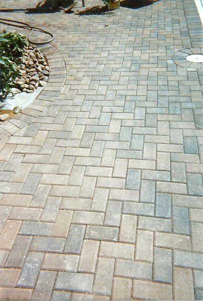 paver walkway around pool area